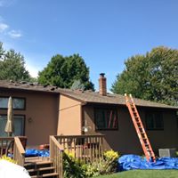House before Custom Steel Roof