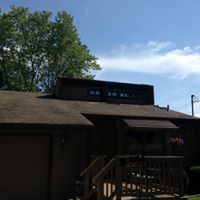 House before Custom Steel Roof