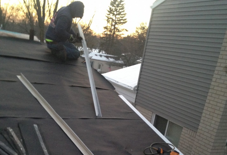 Tar paper and drip edge installed up to code