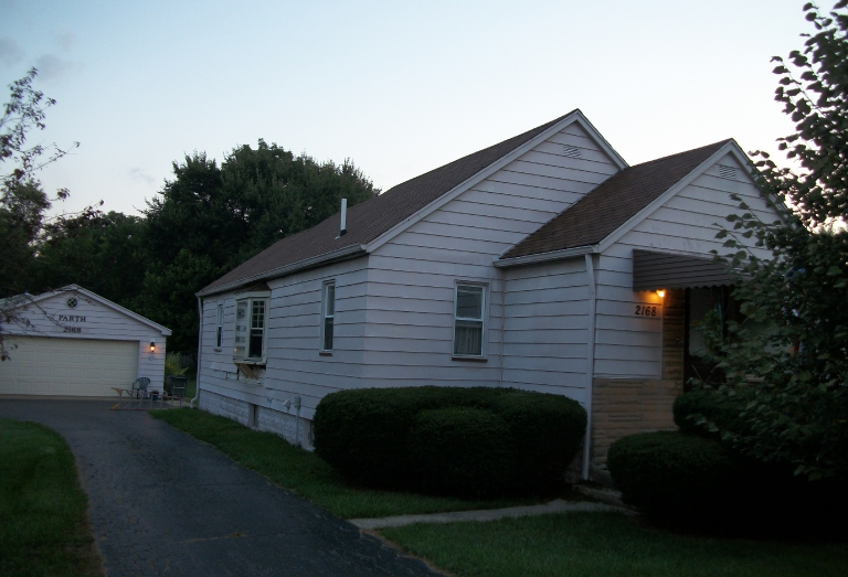 Before new custom red siding