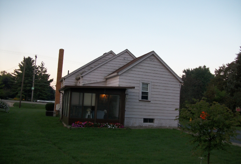 Before new custom red siding